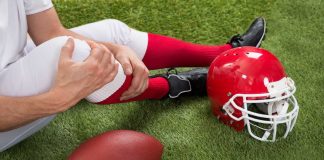 Injured football player leg