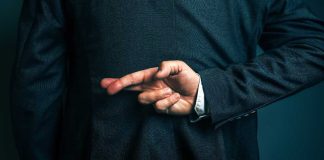 DC Council fines Intralot $5M for lying to secure sports betting contract Fingers crossed indicating deception