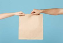 Lawmaker in TX aims to establish new lottery courier standards Courier delivering envelope a la lottery couriers delivering tickets to patrons
