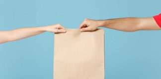 Lawmaker in TX aims to establish new lottery courier standards Courier delivering envelope a la lottery couriers delivering tickets to patrons