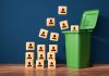 Faces going into a trash can representing another round of layoffs at Catena Media