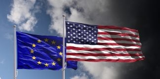 EU and US flags as the former's crpyto policies could be replicated stateside