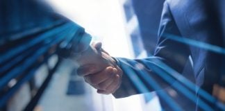 handshake as Internet Vikings partners chat