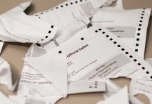 Ripped up ballot signifying end of election contract case