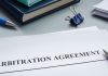 Arbitration agreement ready to be signed as a California judge grants Stake a motion to compel arbitration in a illegal gambling case.