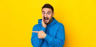 Crypto.com points to Kalshi verdicts in new Nevada lawsuit A man pointing, like Crypto.com is pointing to Kalshi being granted TROs