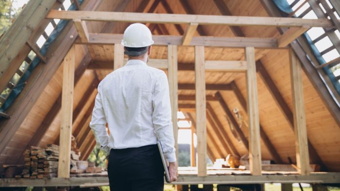 A construction worker stands as DraftKings launches its new budget builder responsible gaming tool.