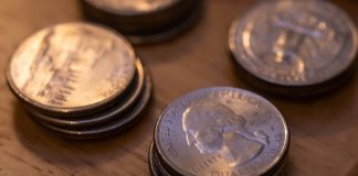 DraftKings latest operator to respond to Illinois wager tax with 50¢ fee Several stacks of quarters as DraftKings plans to implement a 50 cents transaction fee on sports wagers in Illinois.