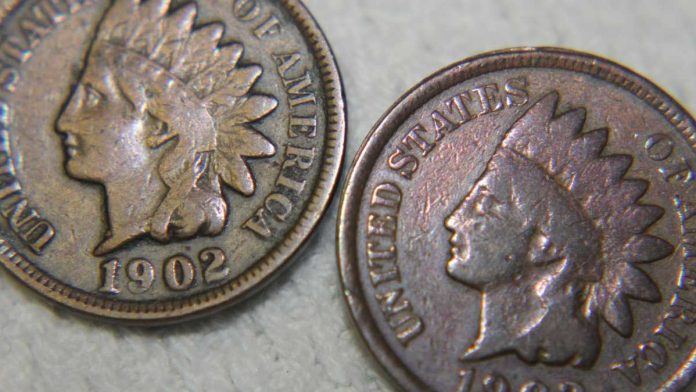 Two Indian pennies