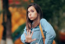 A woman telling someone to stay away