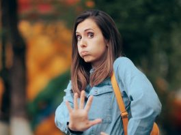 A woman telling someone to stay away