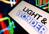 Light & Wonder logo as the company will have its Chief Legal Officer retire at the end of the year.