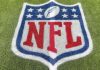 NFL logo on field as the league partners with the ICRG to research gambling behavior.