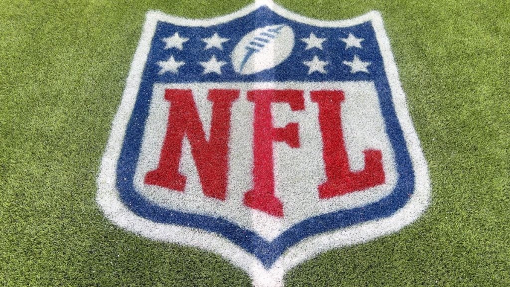 NFL logo on field as the league partners with the ICRG to research gambling behavior.