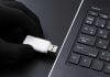 PrizePicks sues former employee who defected to DraftKings Gloved hand with flash drive symbolizing corporate espionage