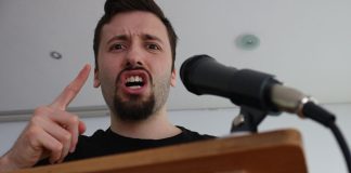 VGW-led sweeps group slams Louisiana and Connecticut bans Angry man speaks into microphone