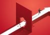 A man runs through a brick wall, much like Ontario's iGaming market surpasses expectations.