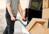 A delivery man handles packages as Bragg Gaming delivers new games to Fanatics Casino.