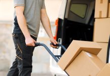 A delivery man handles packages as Bragg Gaming delivers new games to Fanatics Casino.