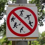 Sign prohibiting several types of sports