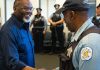 Chicago Mayor Brandon Johnson shakes hands.