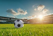 A soccer ball sits as Codere Online secures a deal in women's soccer.