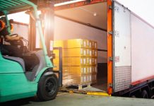 A truck takes off a load of goods as IGT offloads its digital and gaming business.