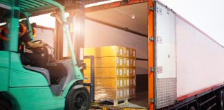 A truck takes off a load of goods as IGT offloads its digital and gaming business.
