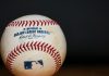 A MLB baseball sits as a player faces an investigation for gambling.