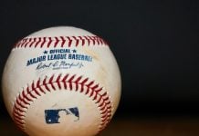 A MLB baseball sits as a player faces an investigation for gambling.