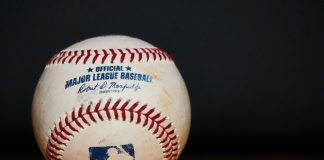 A MLB baseball sits as a player faces an investigation for gambling.