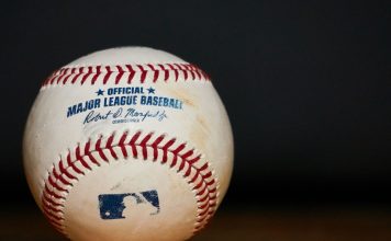 A MLB baseball sits as a player faces an investigation for gambling.
