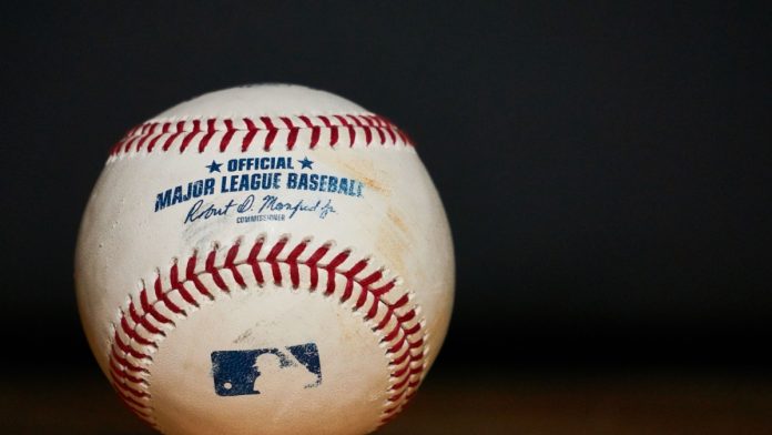 A MLB baseball sits as a player faces an investigation for gambling.