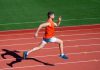 A man running a race, seemingly outpacing the competition