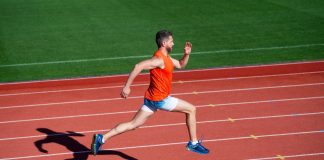 A man running a race, seemingly outpacing the competition