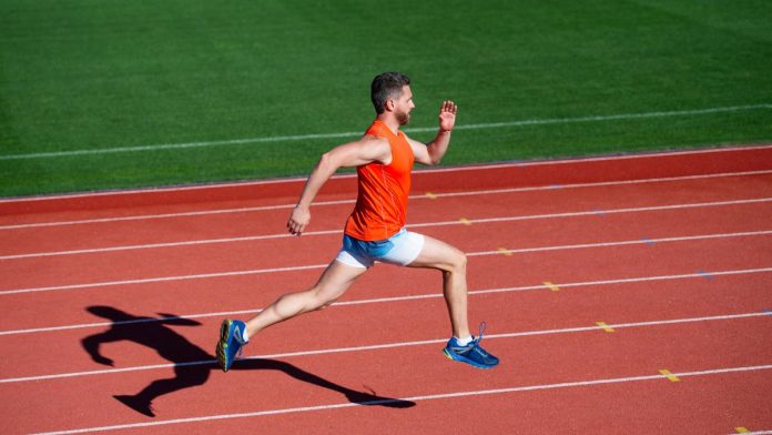 A man running a race, seemingly outpacing the competition