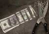 Why a $100 sports bet translates to $1.55 for the sportsbooks $100 bill cut into small pieces