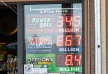 A shop window of a retailer in Oregon selling Oregon Lottery tickets