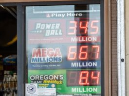A shop window of a retailer in Oregon selling Oregon Lottery tickets