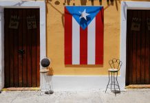 A Puerto Rico flag as PrizePicks secures licenses in the territory and Maine.