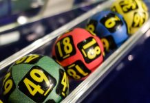 A group of lottery balls as Scientific Games enhances its partnership with Pixiu Gaming.