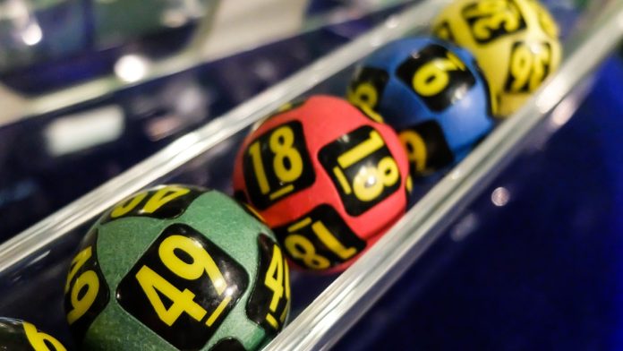 Scientific-Games-iLottery-Pixiu-Gaming-Partnership A group of lottery balls as Scientific Games enhances its partnership with Pixiu Gaming.
