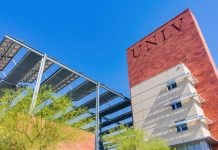 A UNLV sign on a university building