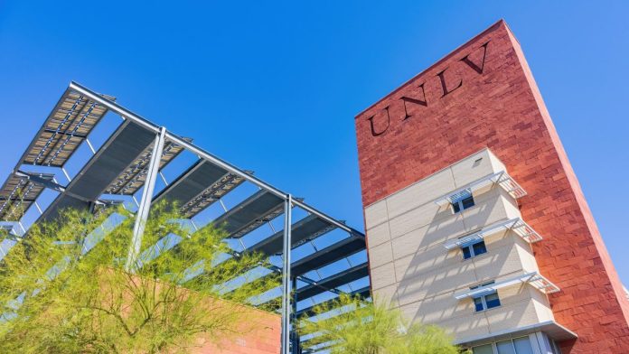 A UNLV sign on a university building