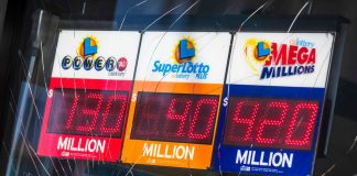 A California storefront displaying lottery jackpot totals