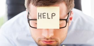 AGs’ cry for help to DOJ shows need for support in black market battle A man when a sticky note on his forehead asking for help