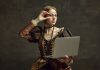 Aristocrat Interactive seals deal to run Massachusetts’ iLottery An aristocratic-looking woman holds a laptop