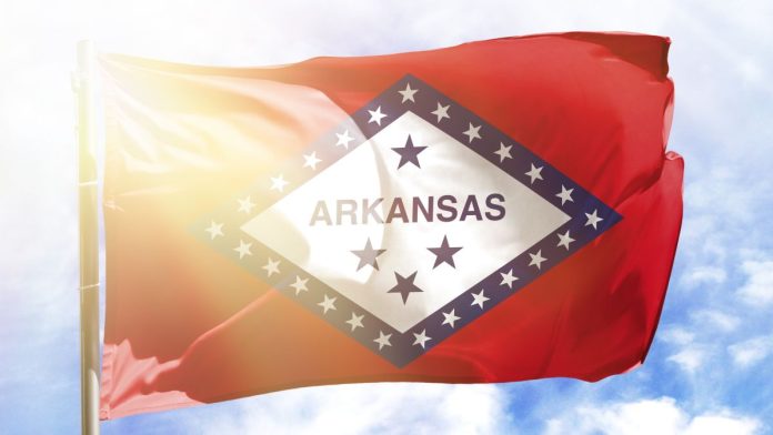 Arkansas-senator-asks-AG-for-formal-opinion-on-prediction-markets The flag of Arkansas with sunshine in the background