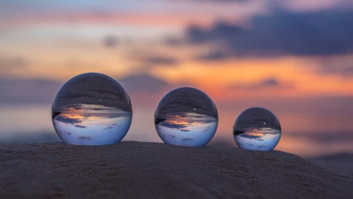 Three crystal balls at sunset
