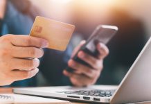 DraftKings to no longer accept credit card deposits as of Aug. 25 A person holds a credit card as DraftKings plans to ban credit card deposits.